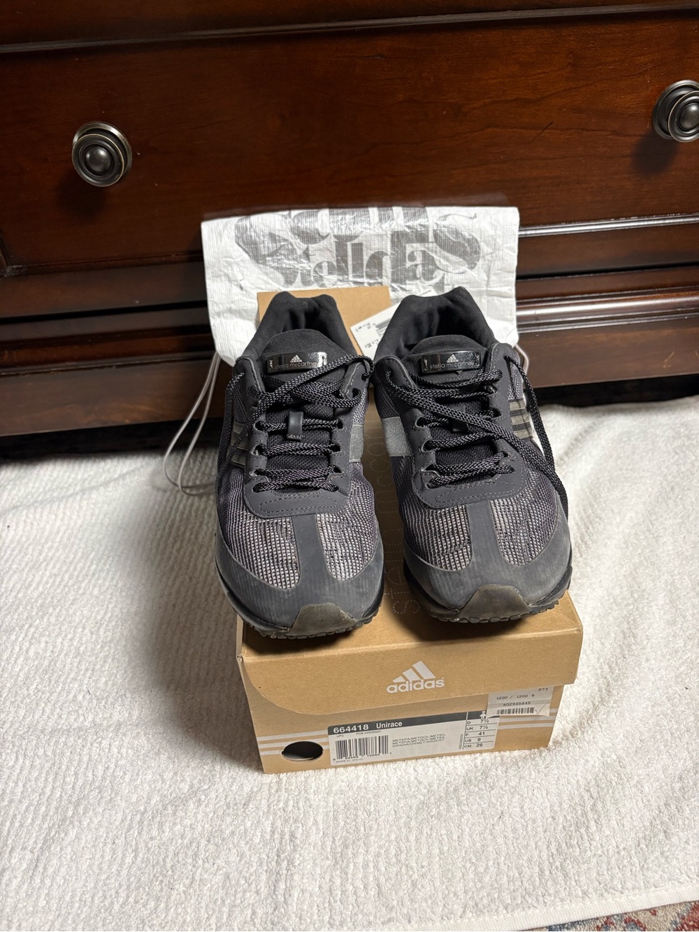 adidas Unirace women’s Black and Gray Athletic Sneakers